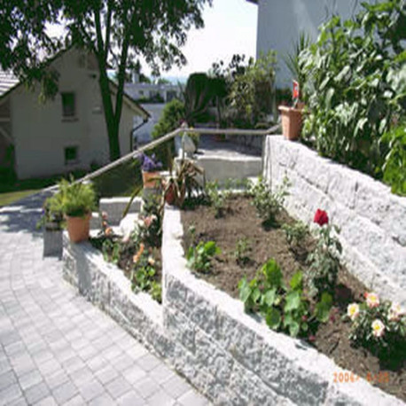 20 x 20 cm Granit-Kleinmauersteine Griys hellgrau auf Paletten